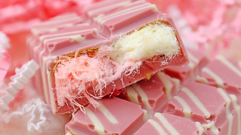 Pink Angel Hair chocolate bar broken in half