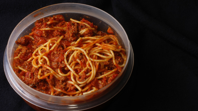 Container of leftover spaghetti