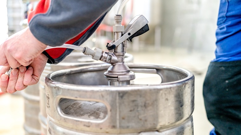 Tapped beer keg in use