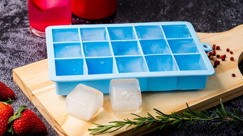 ice cube tray on cutting board