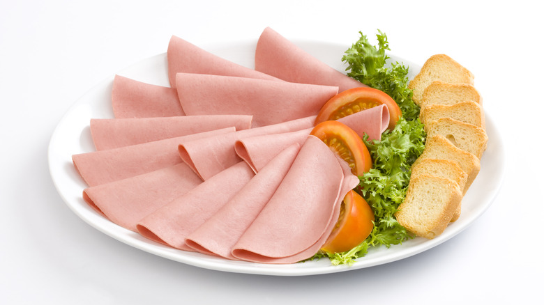 Bologna meat with bread, veggies