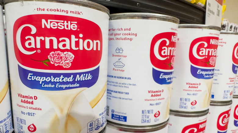 Cans of Carnation evaporated milk