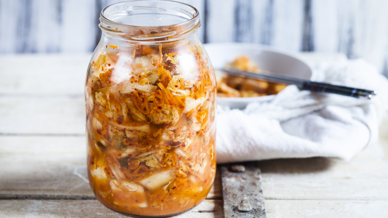 Jar and bowl of kimchi