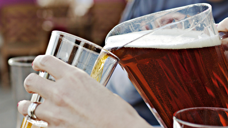 Pouring beer into glass