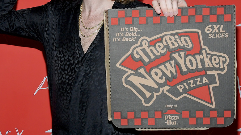 Yung Gravy holding pizza box