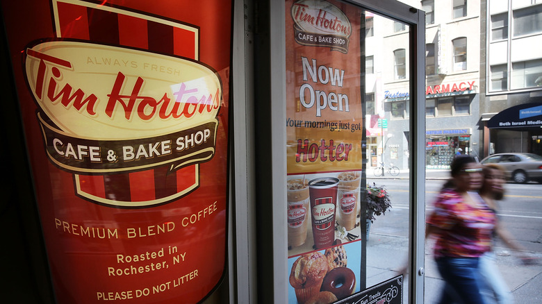 People walking by a Tim Hortons in New York