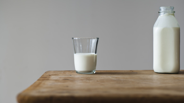 milk bottle next to glass