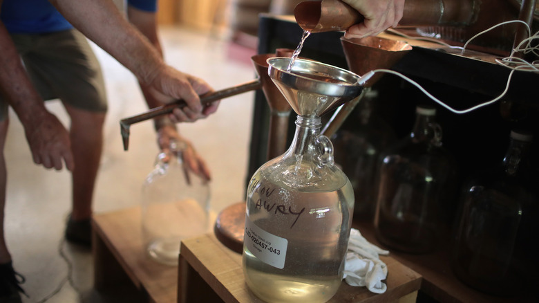 workers preparing moonshine