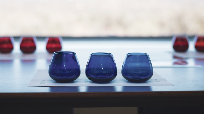 Row of three blue cups