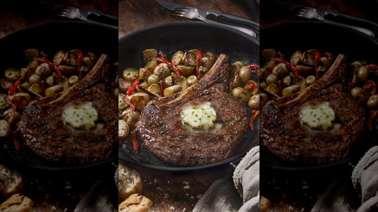 Ribeye steak in pan