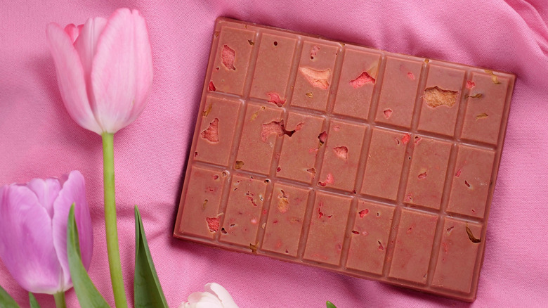 bar of ruby chocolate with tulips