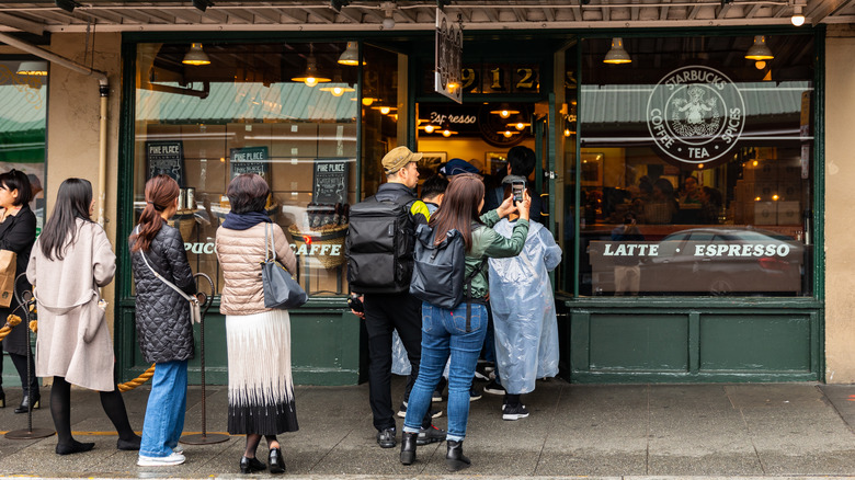 Line of customers outside Starbucks restaurant