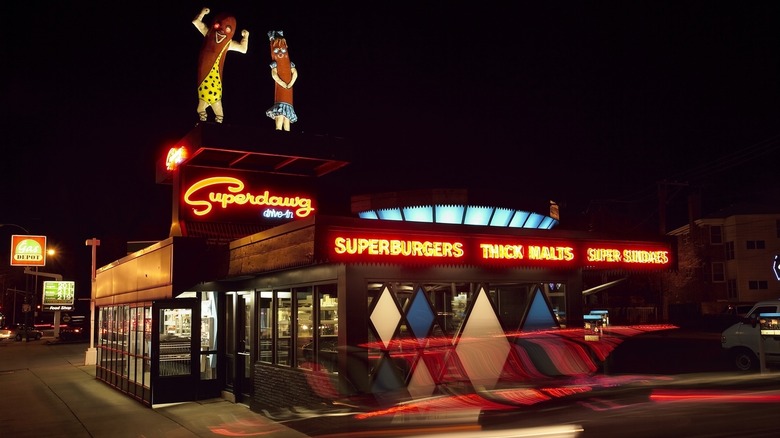 Superdawg at night with lit-up neon signage