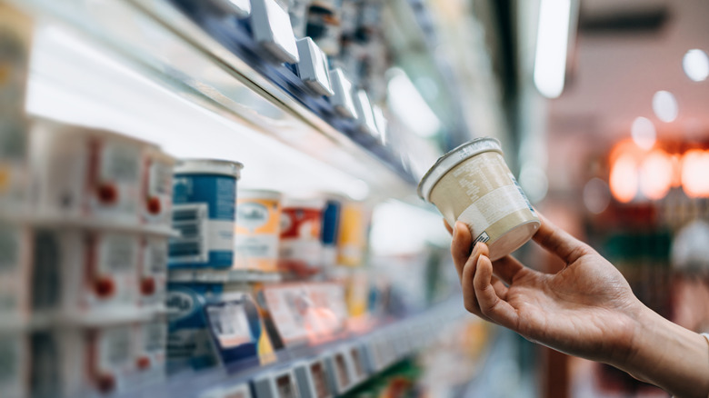 Hand holding grocery item