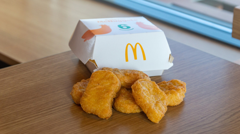 Six-count box of Chicken McNuggets on table