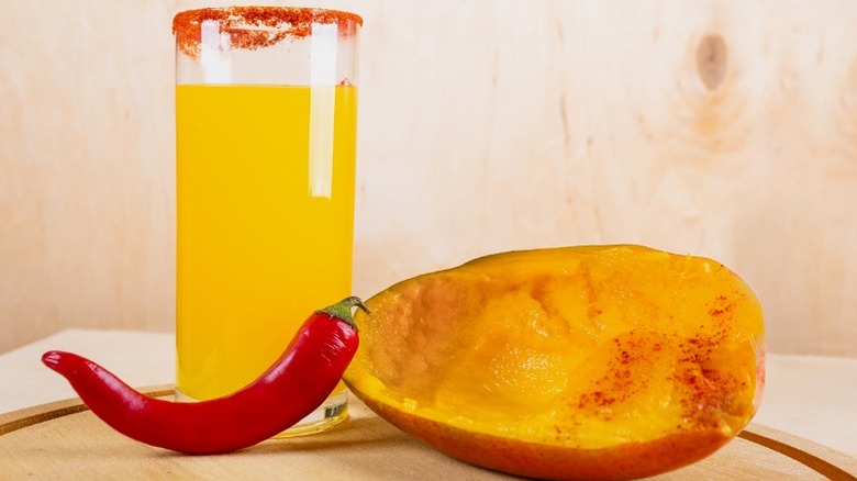 Spicy cocktail with mango and pepper
