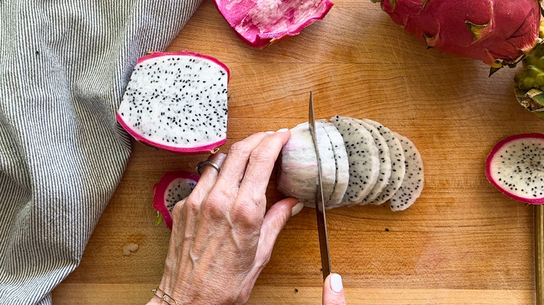 hand slicing fruit