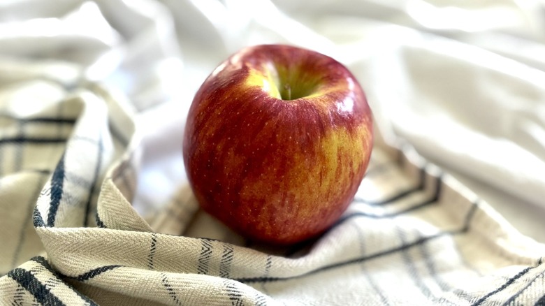 Envy apple on tea towel