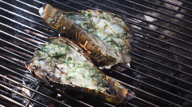 Two lobster tails on grill