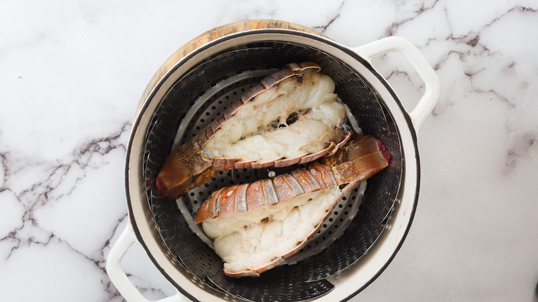 Lobster tails in steaming basket