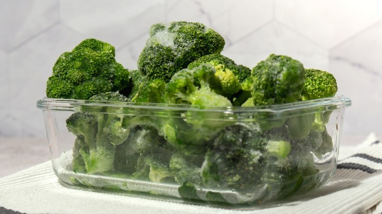 Frozen broccoli in a storage container