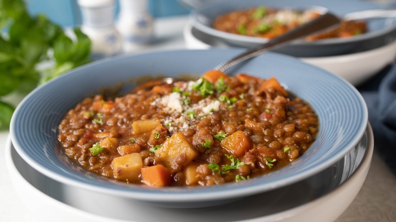 Lentil soup in blue bowl