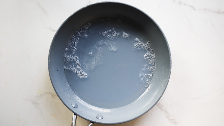 Pot soaking with soapy water