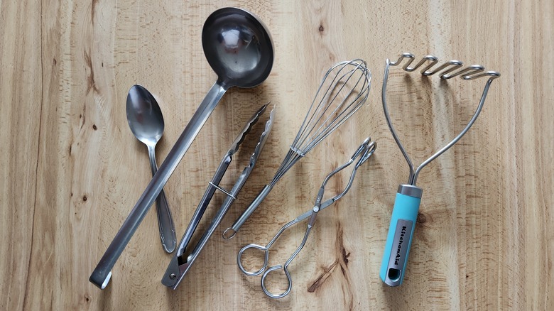 metal kitchen utensils on table