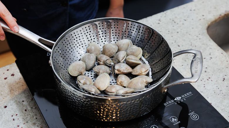 Clams steaming in basket