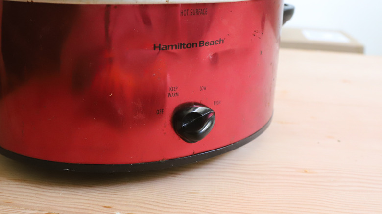 Dial on red Crock-Pot