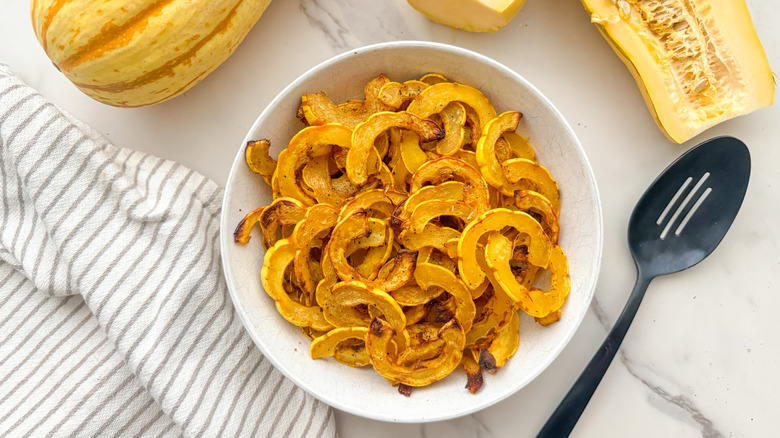 cooked delicata in white bowl