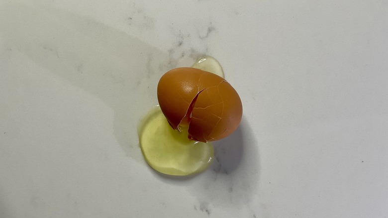 Egg cracked on counter