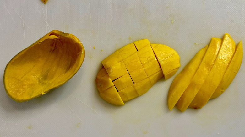 Mango on cutting board