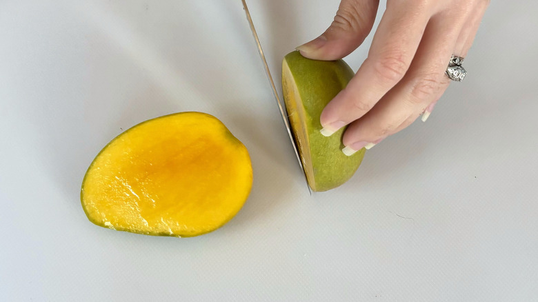 Mango cheek cut off fruit