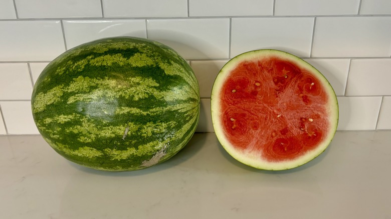 whole watermelon and half