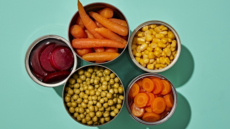 Open cans of vegetables