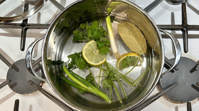 Pot of water and aromatics