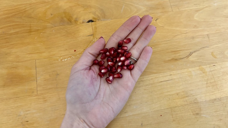 Pomegranates in hand