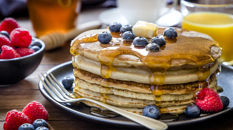 stack of pancakes with fruit