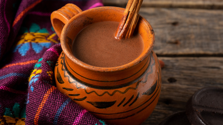 Mexican hot chocolate with a cinnamon stick