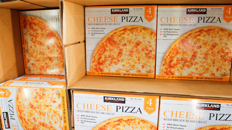 boxes of frozen Kirkland pizzas