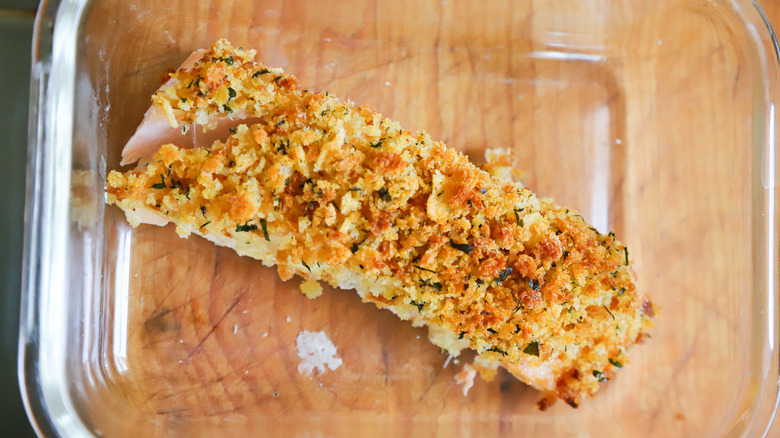 Baked salmon in glass container