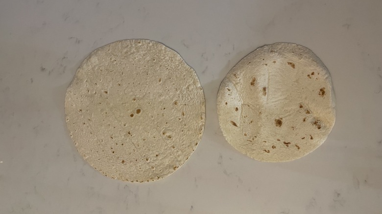 Different sized tortillas on counter