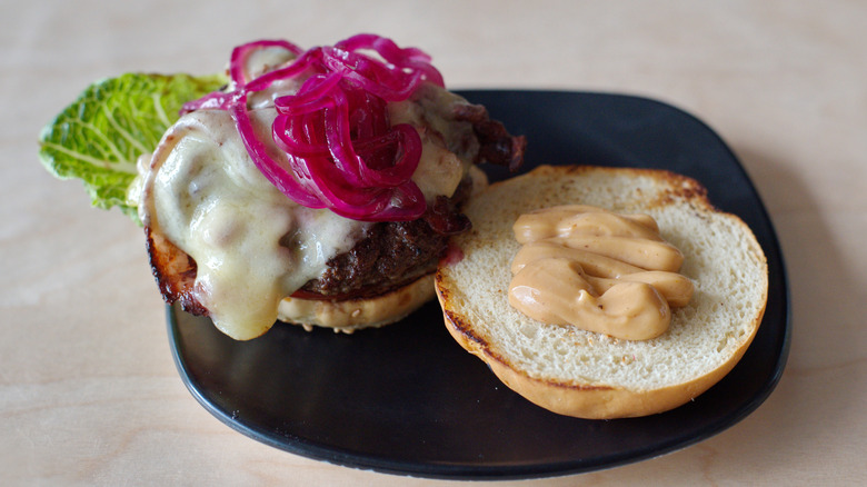 Pickled red onion on a burger