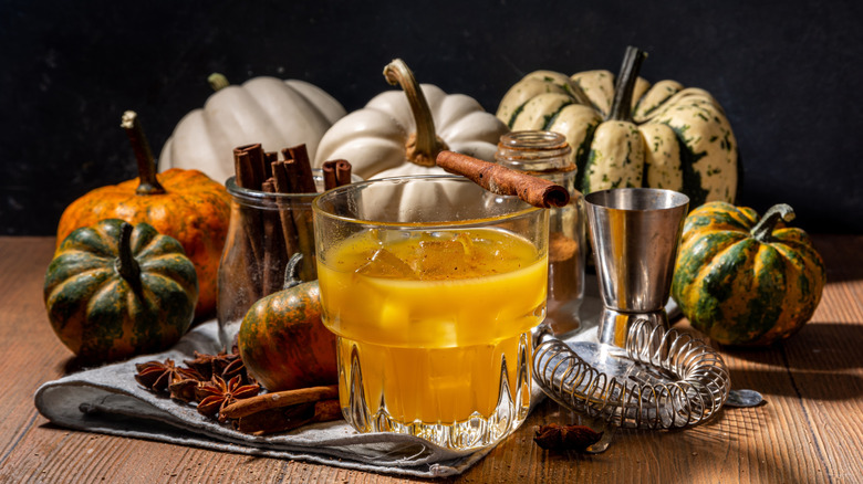 autumn cocktail with cinnamon, star anise, and pumpkin