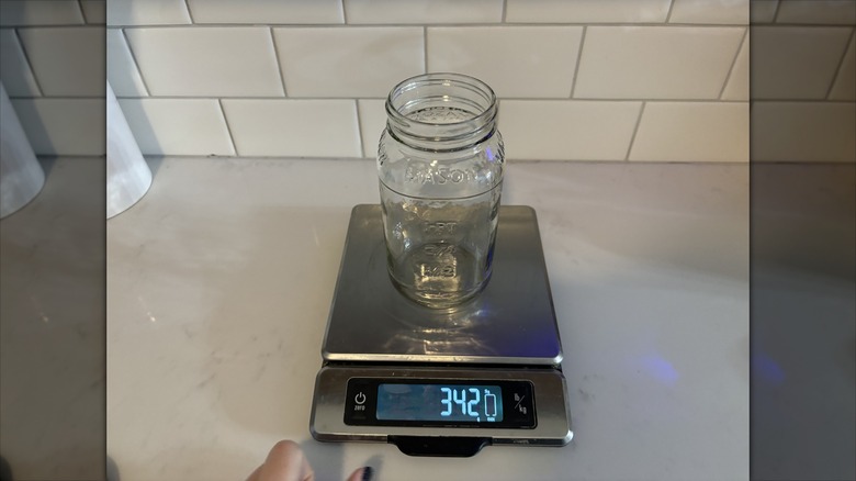 An empty jar on a scale