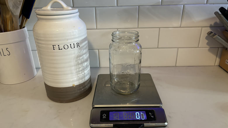 empty cup, flour container, and scale