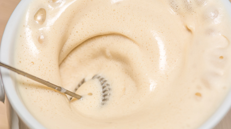 frothing creamy coffee