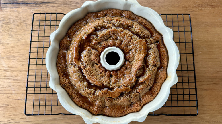 Glaze soaking into Bundt cake
