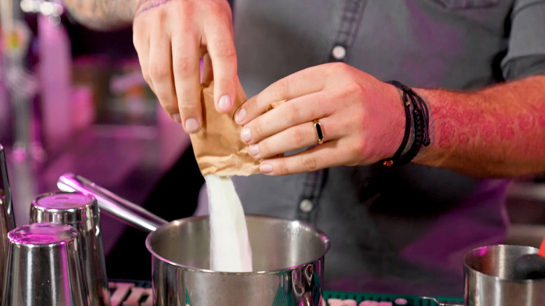 Pouring Jell-O into a pot